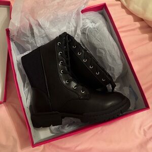 NEW. NEVER WORNShoe Dazzle Black Combat Boots